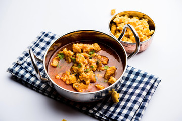 Home made mung dal masala vadi also known as Moong wadi or moongwadi or moongodi sabzi. It's a popular Maharashtrian recipe especially from Vidarbha region.