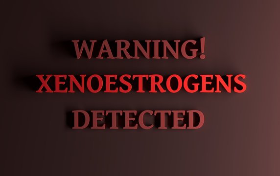 Warning with text Xenoestrogens detected written in bold red letters on dark red background