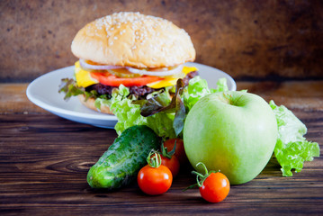 Choice between fresh fruit vegetables and burger