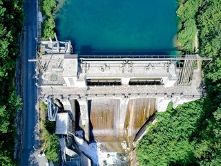 view of the dam from a drone. lake in the italian alps