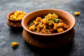 Home made mung dal masala vadi also known as Moong wadi or moongwadi or moongodi sabzi. It's a popular Maharashtrian recipe especially from Vidarbha region.