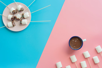 Marshmallows with chocolate in a beatiful background