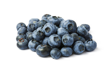 Fresh organic blueberries on a white background. Selective focus
