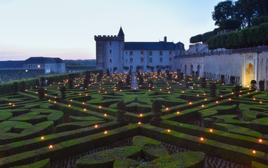 VILLANDRY CASTLE, FRANCE - JULY 07, 2017: The garden illuminated by 2,000 candles at dusk . Nights of a Thousand Lights at Villandry castle, France on July 07, 2017