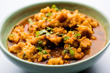 Home made mung dal masala vadi also known as Moong wadi or moongwadi or moongodi sabzi. It's a popular Maharashtrian recipe especially from Vidarbha region.