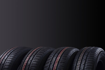 New tires on a dark background © Dmytro