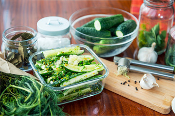 freshly salted cucumbers, and ingredients for conservation. instant pickles