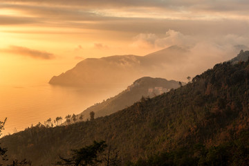 Sunset over the Ligurian Sea. Trekking transition between the cities of Cinque Terre.
