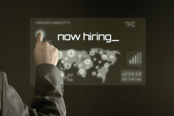 Business man pointing to virtual screen. Business & Technology Concept