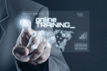 Business man pointing to virtual screen. Education & Technology Concept