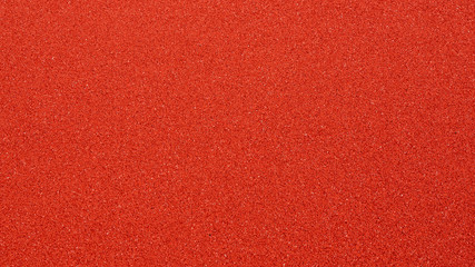 Close-up of Brandnew Red Outdoor Basketball Court Floor, Background Texture