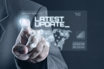 Business man pointing to virtual screen. Business & Technology Concept