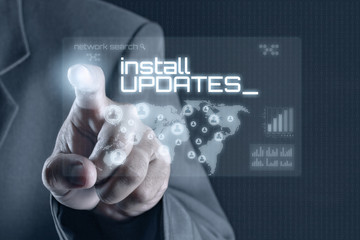 Business man pointing to virtual screen. Business & Technology Concept