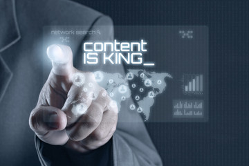 Business man pointing to virtual screen. Business & Technology Concept