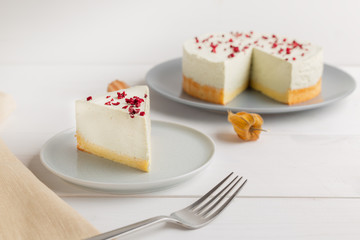 Matcha green tea cheesecake on white background