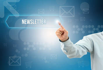 business man touch a button on an imaginary screen with text NEWSLETTER