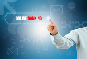 business man touch a button on an imaginary screen with text ONLINE BANKING