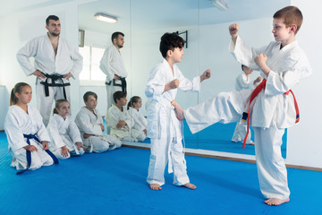 Fototapeta na wymiar Positive children training to master new moves