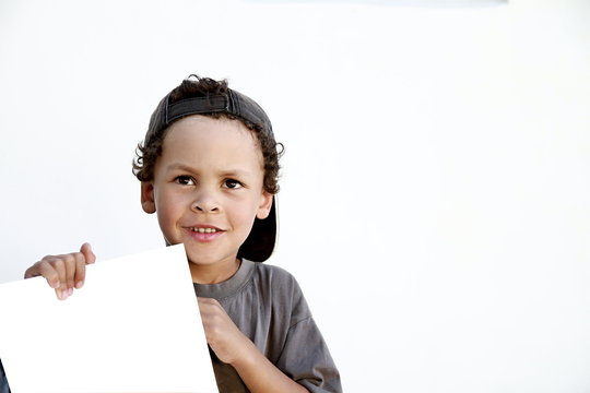 little boy with his school books on white background stock image and stock photo