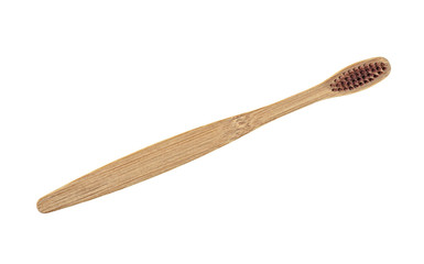 Bamboo toothbrush on white background. Eco-friendly bamboo toothbrush.