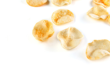 Potatoes snack with pepper on isolated white background. Closeup