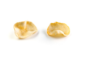 Potatoes snack with pepper on isolated white background. Closeup