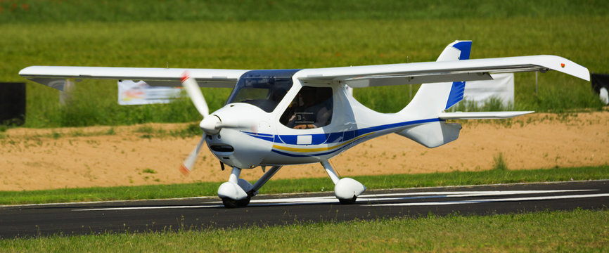 Picture of small sports airplane  at the sport airport
