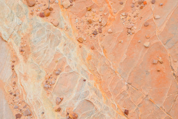 ピンク、黄色、オレンジの砂岩テキスチャー、背景