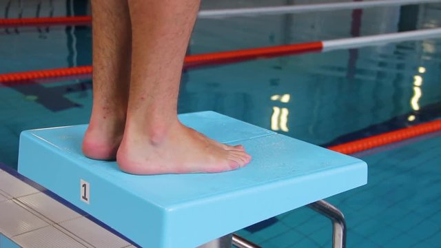 blue starting block in the pool. Pool equipment. Swimmng competition.