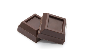 Broken chocolate bar isolated on white background