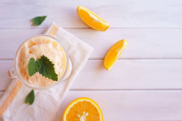 orange smoothie, milkshake with orange and mint