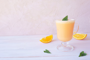 orange smoothie, milkshake with orange and mint