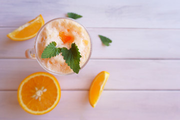 orange smoothie, milkshake with orange and mint