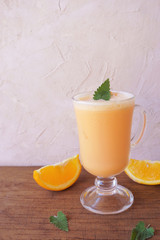 orange smoothie, milkshake with orange and mint