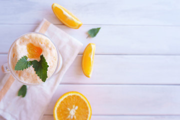 orange smoothie, milkshake with orange and mint
