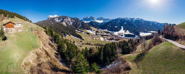 Alps mountain Santa Maddalena village with Dolomites in background, Trentino Alto Adige region, Funes valley, Italy.