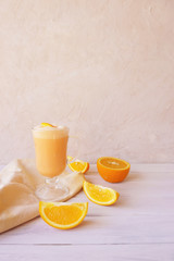 orange smoothie, milkshake with orange and mint