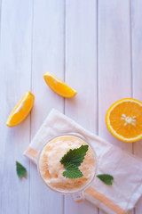 orange smoothie, milkshake with orange and mint