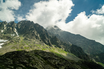 High Tatras valley during nice sunny day with dramatic clouds