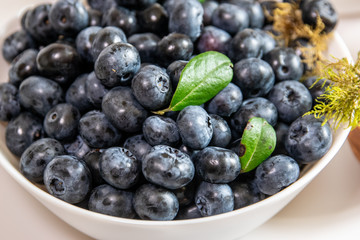 Blueberry and sugar in a bowl in the kitchen.