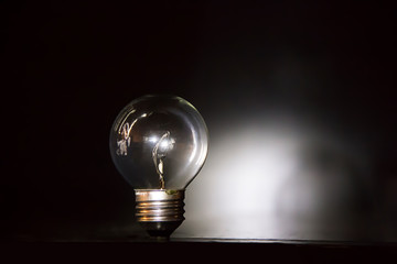 lightbulb in front of a spotlight