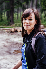 Fototapeta premium Young woman on the trail in Giant Mountains (Karkonosze), authentic travel experience. 