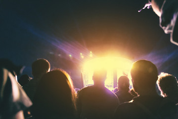 Fototapeta premium Crowd of spectators having fun at a concert.