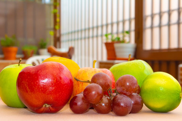 Red and green fruits close up in the garden
