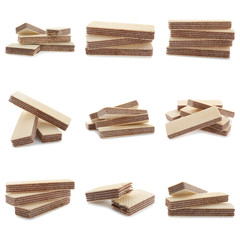 Set of delicious crispy wafers on white background
