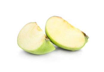 Pieces of fresh green apple on white background