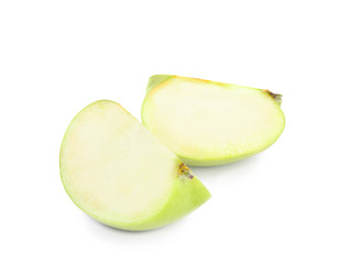 Pieces of fresh green apple on white background
