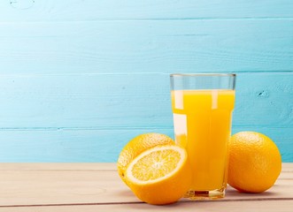 Orange juice and slices of orange on background © BillionPhotos.com