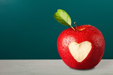 Red apple with a heart shaped
