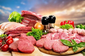Fresh Raw Meat Background with vegetables